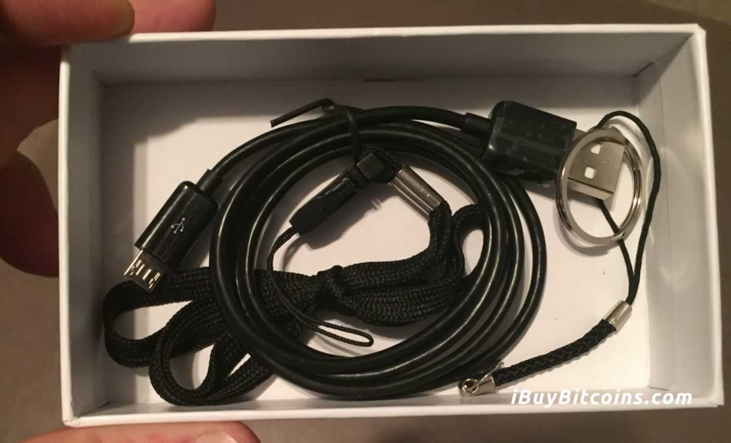 Bottom of the Nano S box included cables and key chain holders.